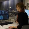 image of researcher looking at a brain scan