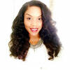 Dijonée A. Talley in a white shirt smiling into the camera