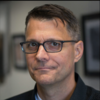 image of James wearing glasses
